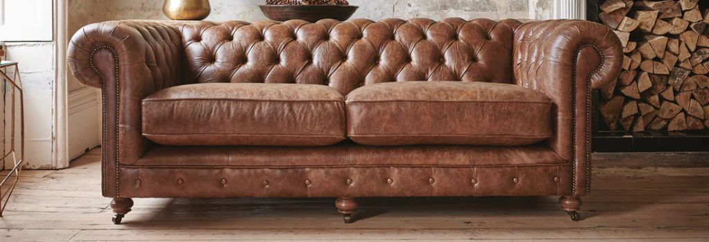 Pair Brown Shade Couch With Wood Tones